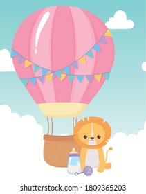 baby shower, cute lion milk bottle rattle and air balloon, celebration welcome newborn vector illustration