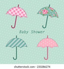 Baby shower invitation elements as cute fabric applique of umbrella on rain drops background