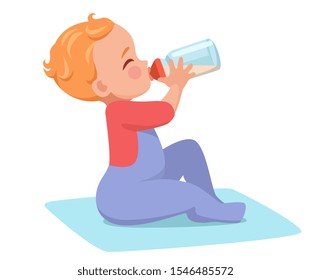Baby sits and drinks baby food from a bottle