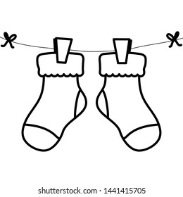 baby socks clothes hanging in wire