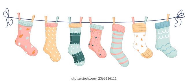 Baby socks with patterns on a rope with colored clothespins. Vector illustration
