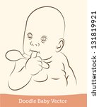 baby with a spoon