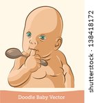 baby with a spoon