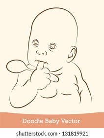 baby with a spoon