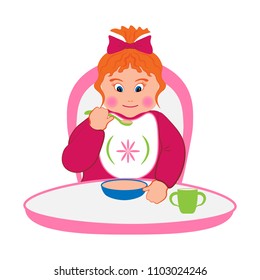  Baby at the table eats porridge