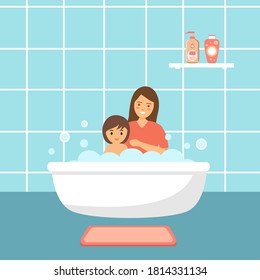 Baby taking bath playing with mother. Little child in bathtub. Smiling kids in bathroom with foam. 