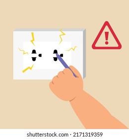 Baby touching an electrical socket and danger with kids.
