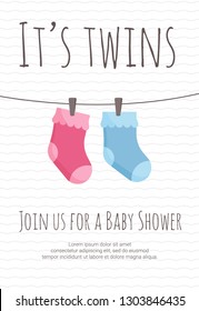 Baby twins arrival and shower invitation template with pink and blue toddler socks hanging on pins.