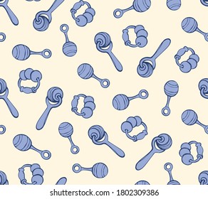 Babyish teething playful noisy clacks set on light yellow backdrop. Freehand line blue ink hand drawn cute joy noisemaker object logo sign icon emblem symbol in art retro cartoon style pen on paper