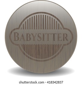 Babysitter badge with wood background