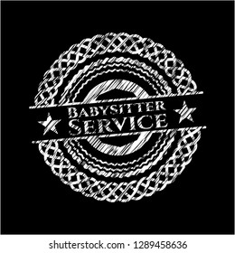 Babysitter Service written on a blackboard