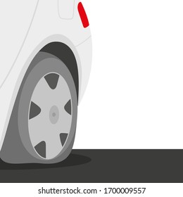 The back of the car with a flat tire