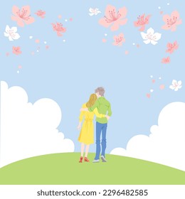 The back of a couple walking on a flowery path leaning on each other