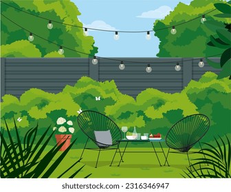 Back patio with garden furniture on a background of green plants.