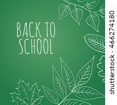 Back to School. Autumn leaves are drawn with chalk on the dark green chalkboard. Fall of the leaves. Sketch, doodles, hand drawn floral elements for your design.