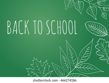 Back to School. Autumn leaves are drawn with chalk on the dark green chalkboard. Fall of the leaves. Sketch, doodles, hand drawn floral elements for your design.