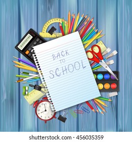 Back to school background with supplies tool, a sheet of notebook and space for text. Layered vector illustration on wood background.
