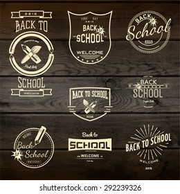 Back to School badges logos and labels for any use, on wooden texture