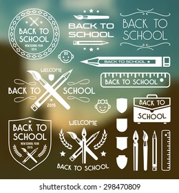 Back to school badges set. White print on blurred background