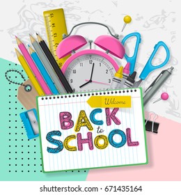 Back to school banner design with lettering and school supplies. Flat lay style