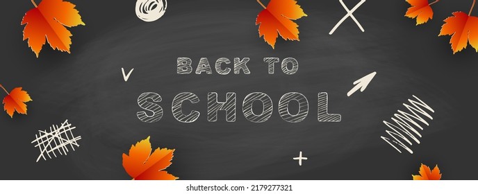 Back to school - blackboard with autumn leaves, doodles and chalk lettering. Template for your text. Vector illustration.