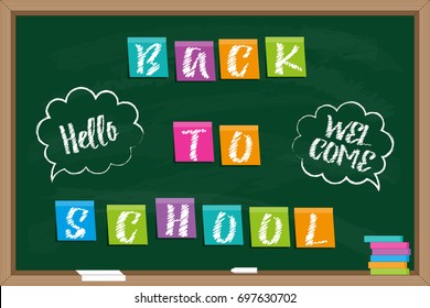 Back to school. Blackboard with Inscription on color sticky paper and chalk drawn inscriptions in speech bubbles.