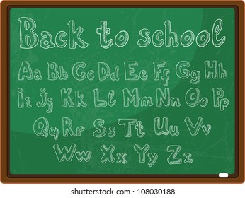 back to school - the school board with the handwritten alphabet