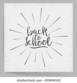 Back To School. Calligraphic Quote. Typographic Design. Hand Lettering Text With Sunburst. Black Text on White Background. For Your Design. Vector illustration
