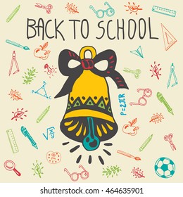 Back to school card with school bell and other school facilities. The school bell on beige background