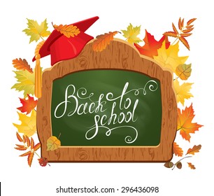 Back To School card.  Green chalkboard, Graduation Cap and autumn leaves.