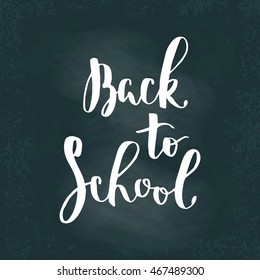 Back to school card. Hand drawing ink lettering vector art, modern brush calligraphy motivational poster on chalk board background.