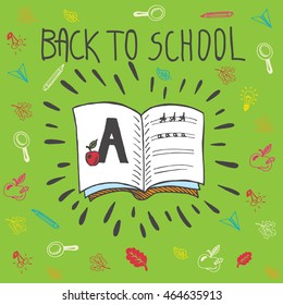 Back to school card with spell book and alphabet exercise. The spell book on green background