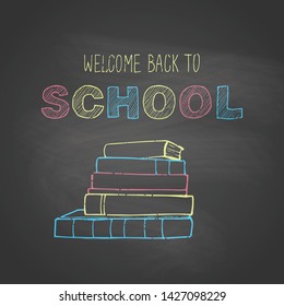Back to school card. Welcome back to school  phrase. Gray chalkboard background.