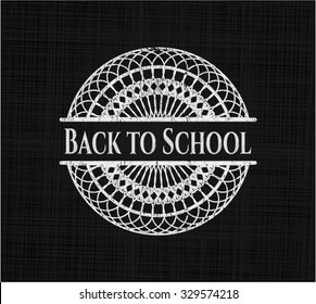 Back to School chalk emblem written on a blackboard