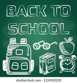 back to school with chalk font on blackboard