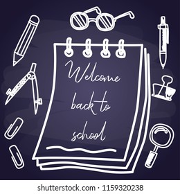 back to school with chalk font on blackboard