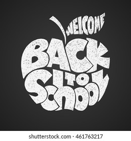 Back to school. Chalk lettering inscribed in the apple shape