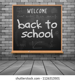 Back to school chalkboard design lettering. Blackboard with text back to school, made with chalk on the brick wall.