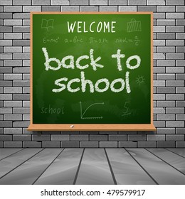 Back to school chalkboard design lettering. Blackboard with text back to school, made with chalk on the brick wall.