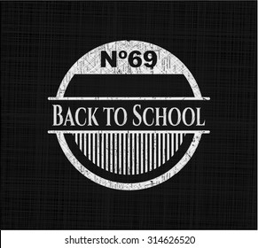 Back to School chalkboard emblem written on a blackboard