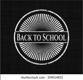 Back to School chalkboard emblem written on a blackboard