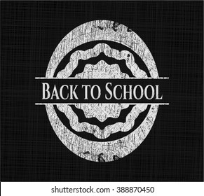 Back to School chalkboard emblem written on a blackboard