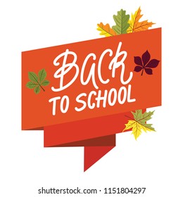 Back to school concept with ribbon banner, lettering on it and orange leaves.