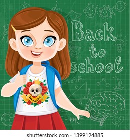 Back to school - cute brunette teenager girl with backpack at the  blackboard