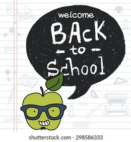 Back to school doodle background with hipster green apple in glasses and black speech bubble for the text with hand drawn lettering on lined notebook paper.