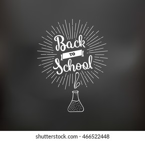 Back to school emblem. Isolated vector element. First day of school logo. Calligraphy, lettering design. Typography for greeting cards, posters, banners.