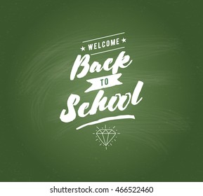 Back to school emblem. Isolated vector element. First day of school logo. Calligraphy, lettering design. Typography for greeting cards, posters, banners.
