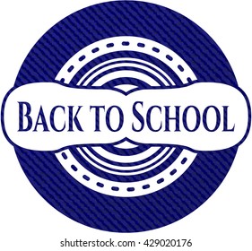 Back to School emblem with jean texture