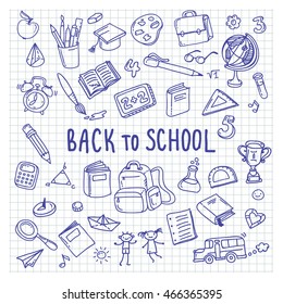 Back to school. Freehand drawing school items on a sheet of exercise book.