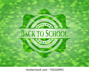 Back to School green emblem with triangle mosaic background